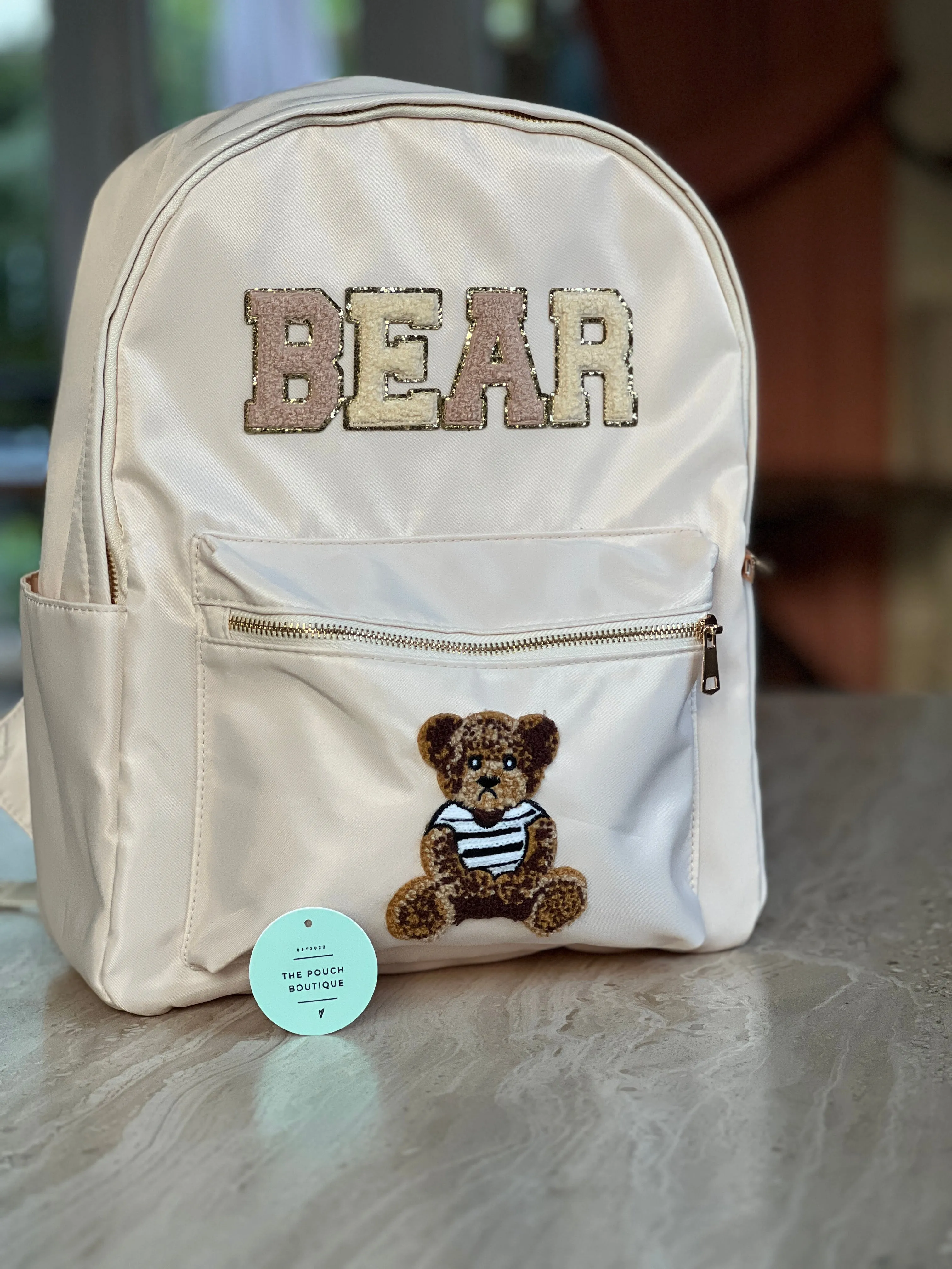 Best selling backpack with patch letter & motifs