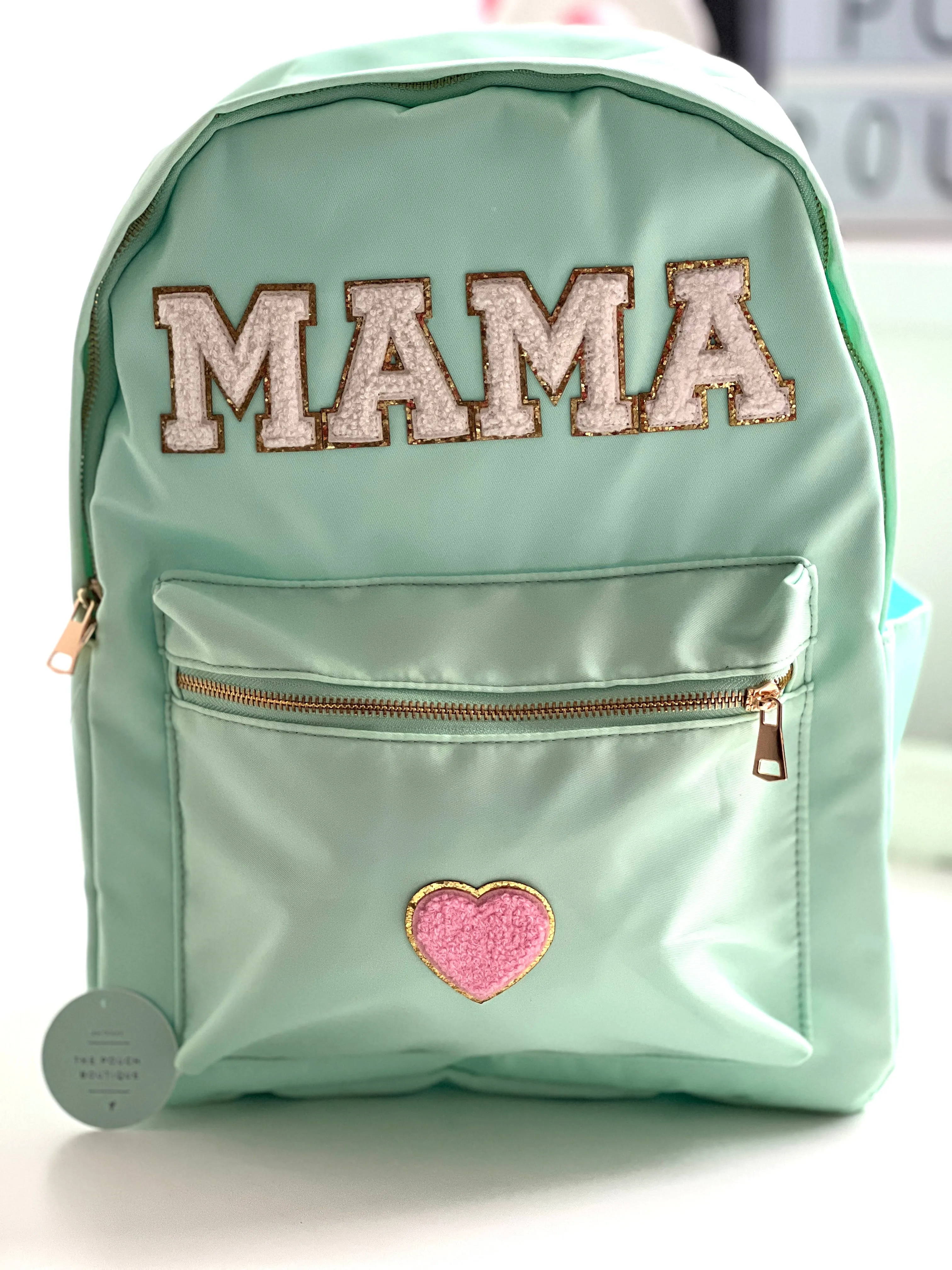 Best selling backpack with patch letter & motifs