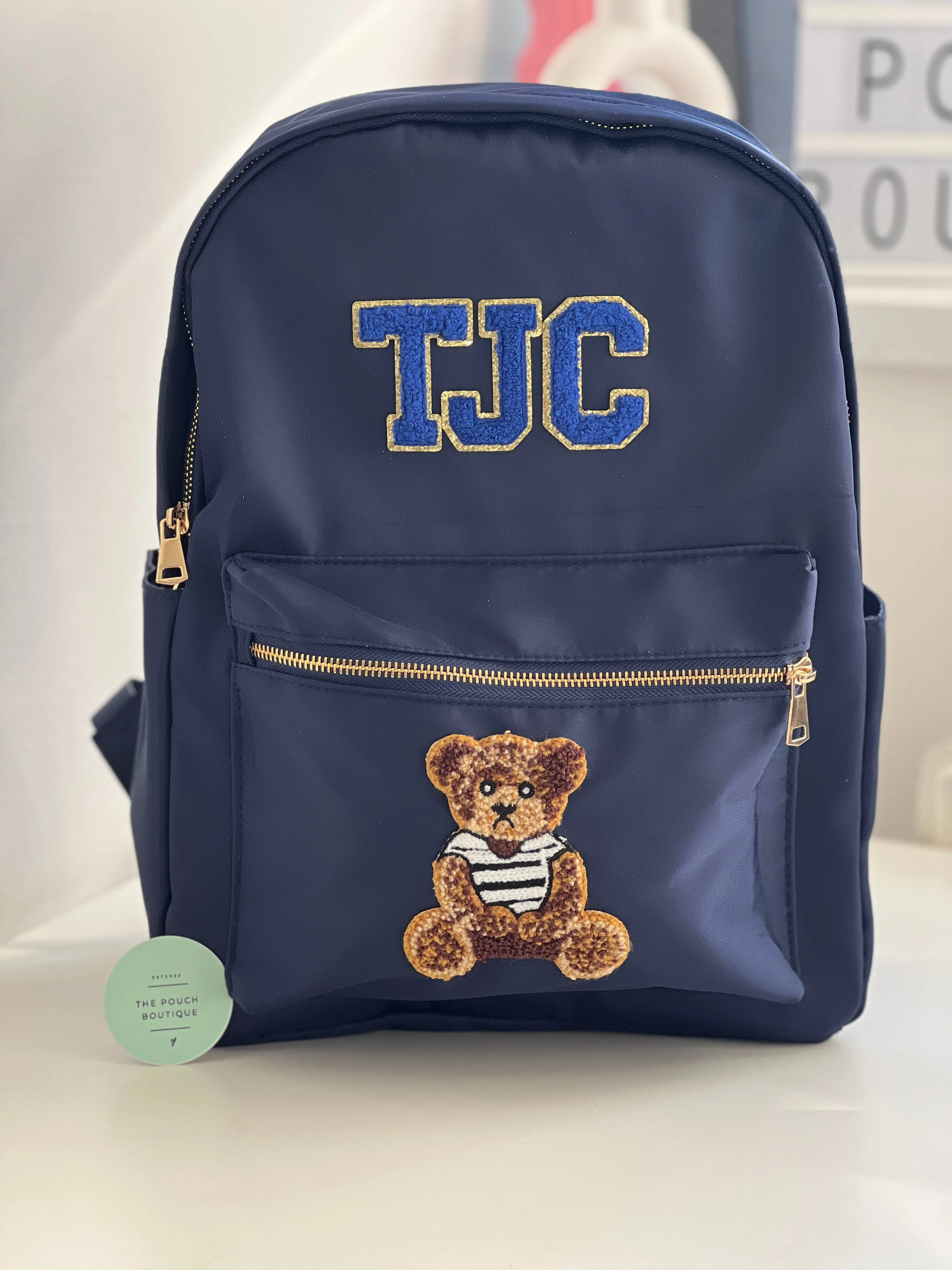 Best selling backpack with patch letter & motifs