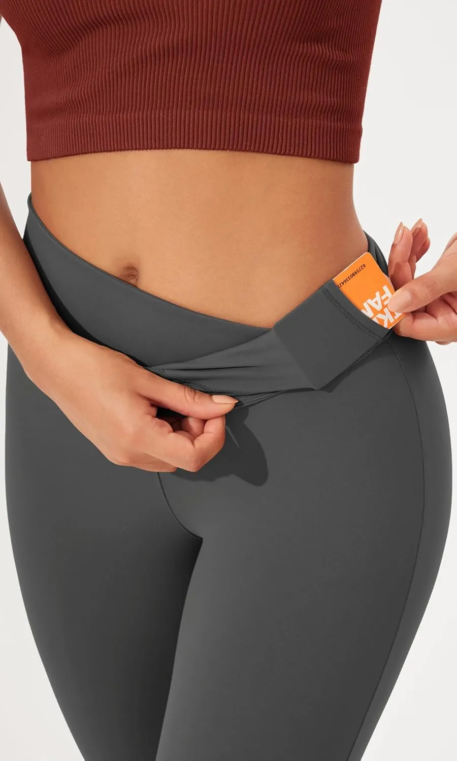 ODODOS Women's Cross Waist Bootcut Yoga Pants with Inner Pocket, Non See Through Bootleg Gym Workout Pants